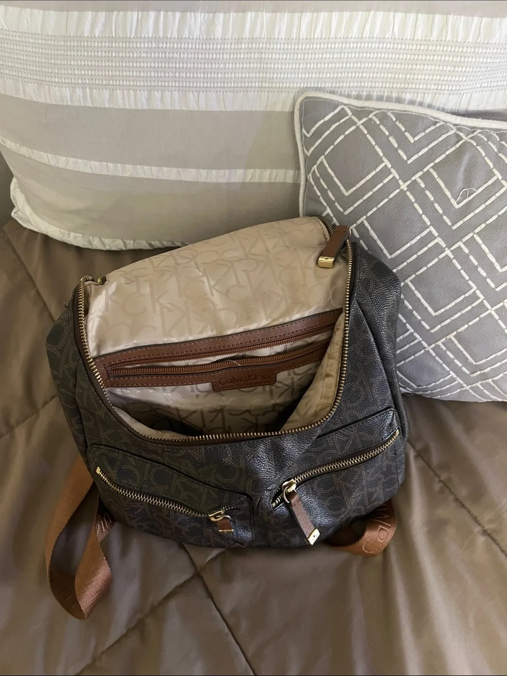 Calvin Klein Brown Monogram Backpack with Gold Hardware